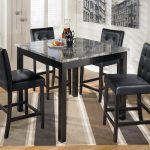 5 piece Maysville Counter Height Dining Room Table and Bar Stools